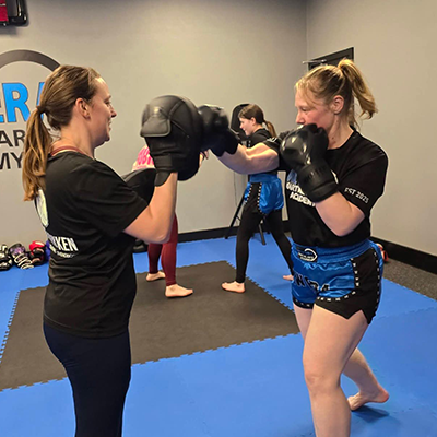 Women practicing self-defence