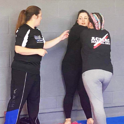 Women practicing self-defence